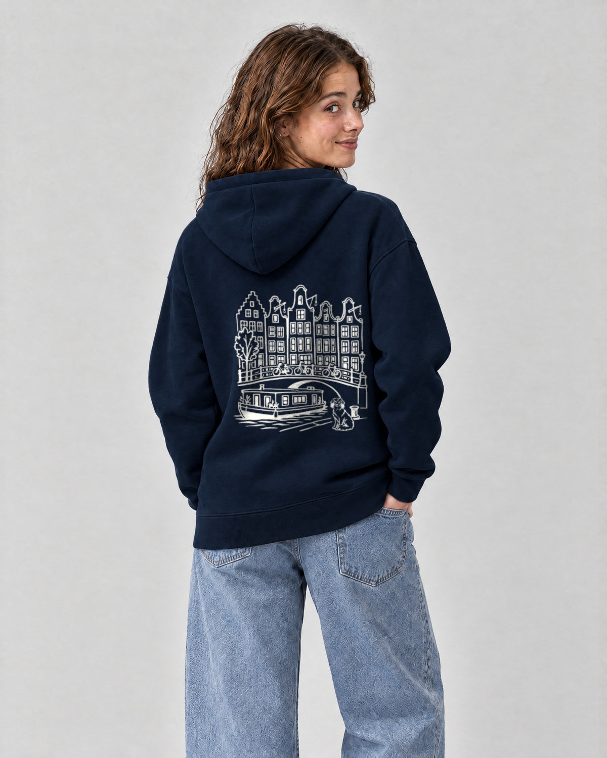 Amsterdam Chapter Hoodie - Navy on a model, from behind