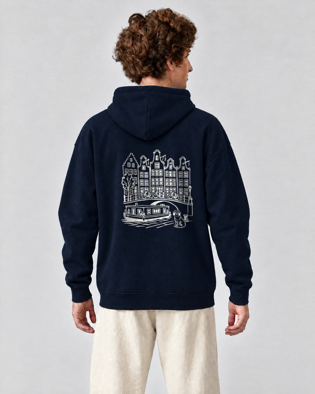 Amsterdam Chapter Hoodie - Navy on a model, from behind