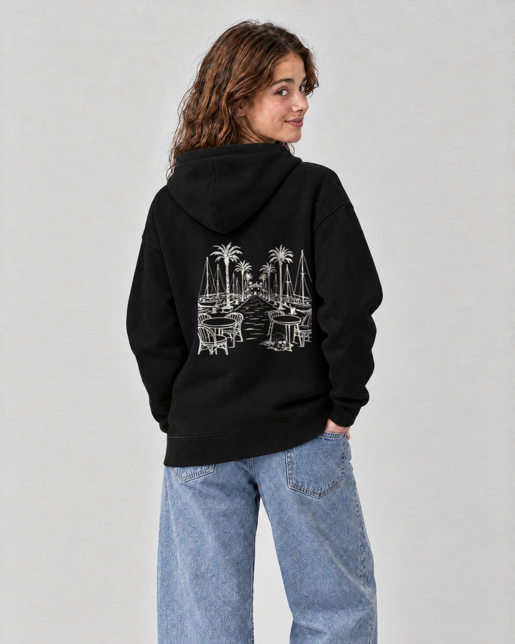 Marbella Chapter Hoodie - Black on a model, from behind