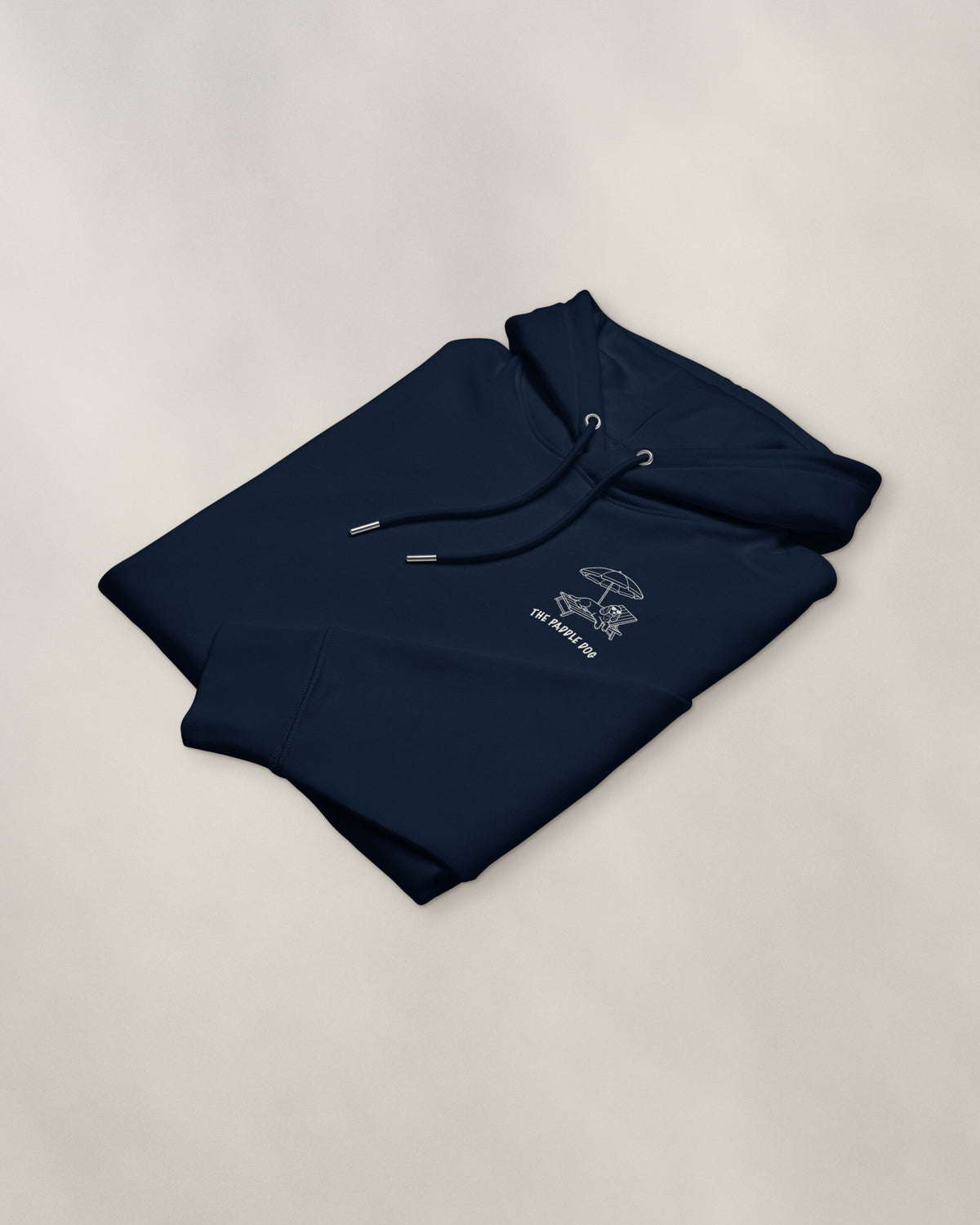 Marbella Chapter Hoodie - Navy, folded, the crest on the chest