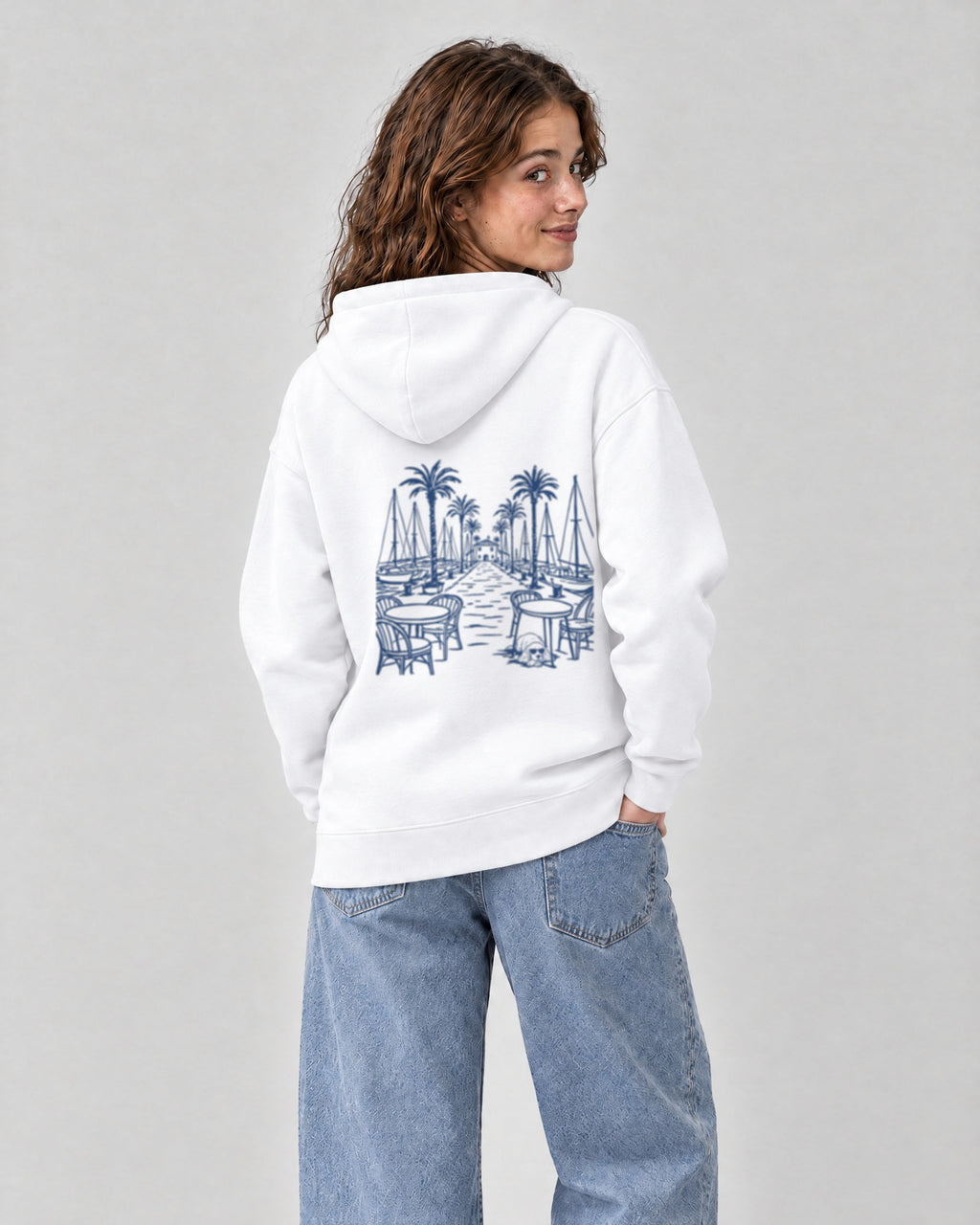 Marbella Chapter Hoodie - White on a model, from behind