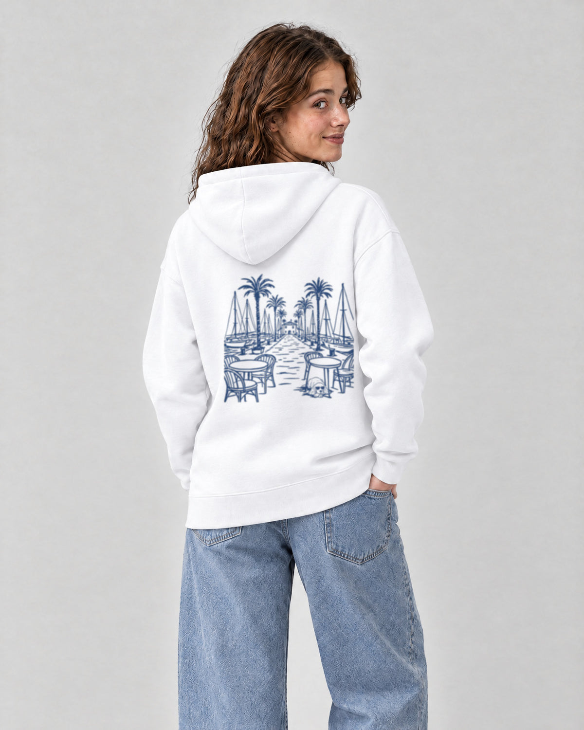Marbella Chapter Hoodie - White on a model, from behind