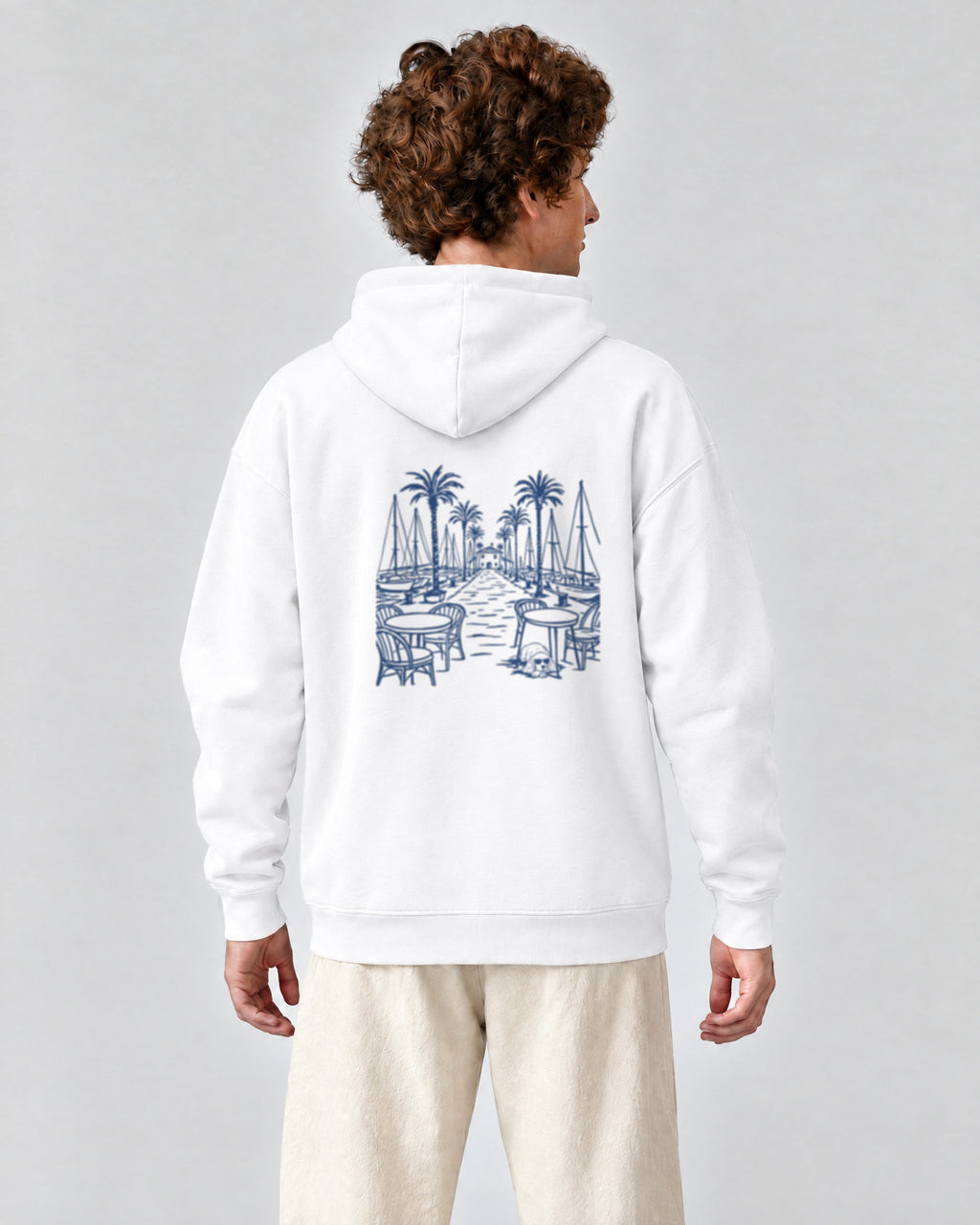 Marbella Chapter Hoodie - White on a model, from behind