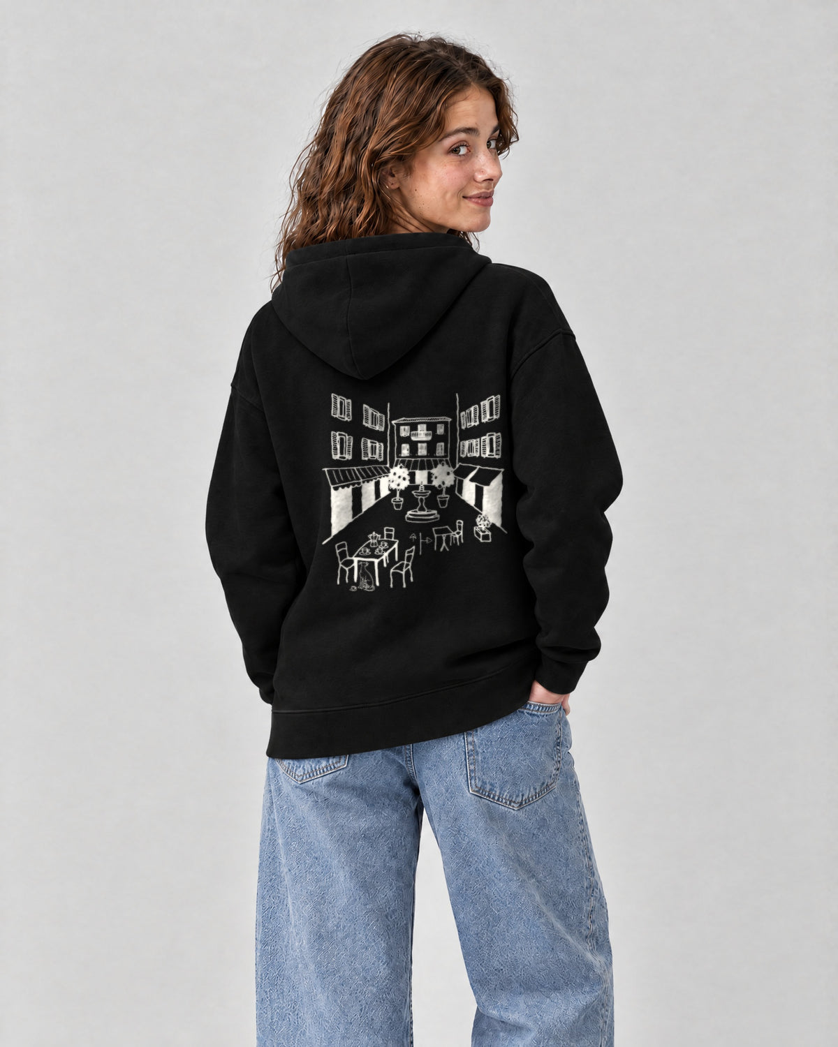 Milano Chapter Hoodie - Black on a model, from behind