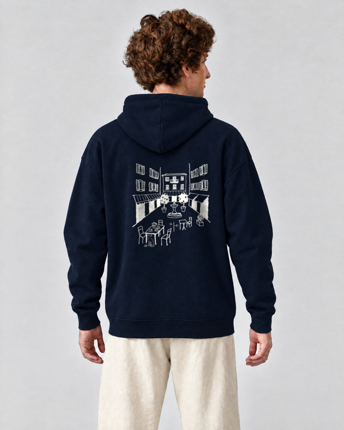 Milano Chapter Hoodie - Navy on a model, from behind