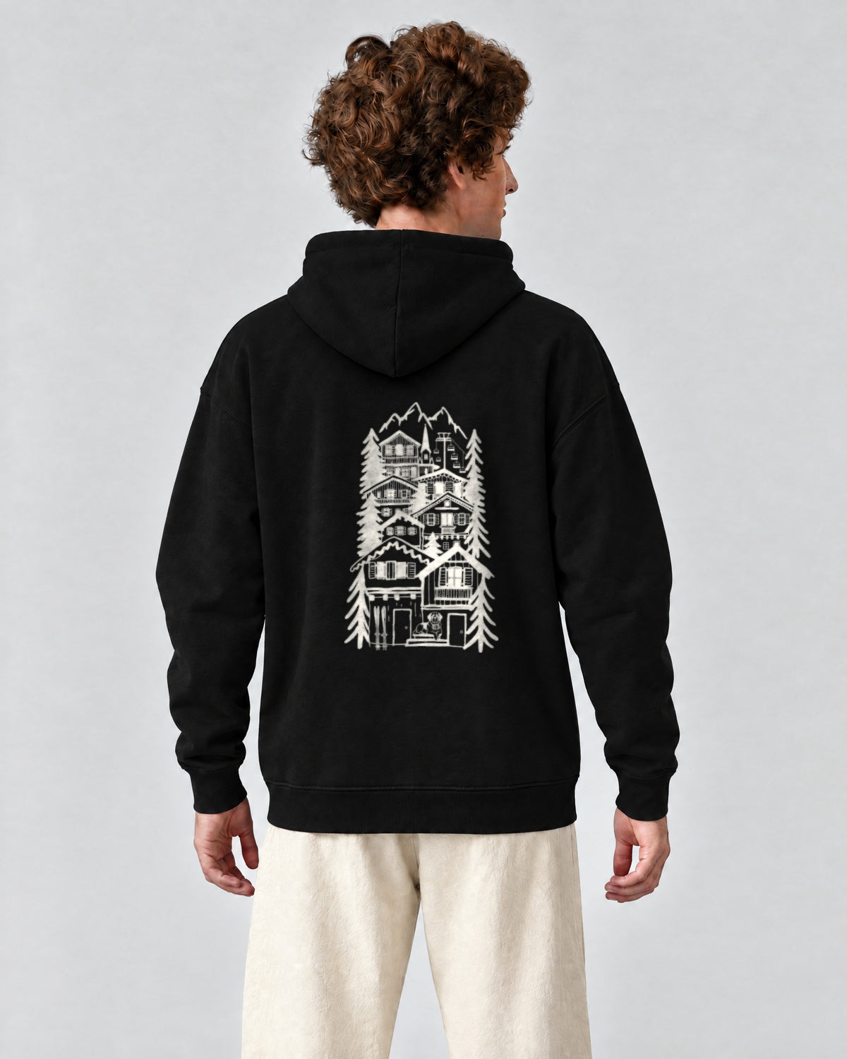 St Moritz Chapter Hoodie - Black on a model, from behind