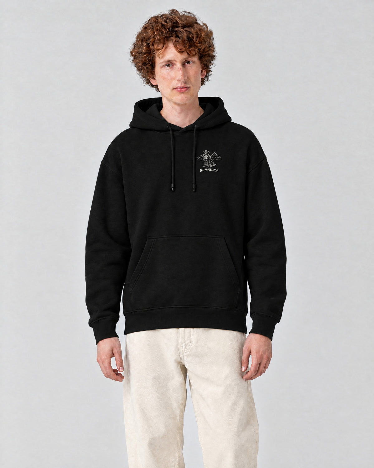St Moritz Chapter Hoodie - Black on a model, from the front