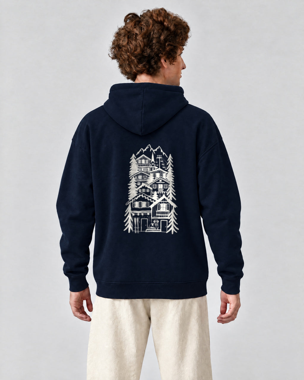 St Moritz Chapter Hoodie - Navy on a model, from behind