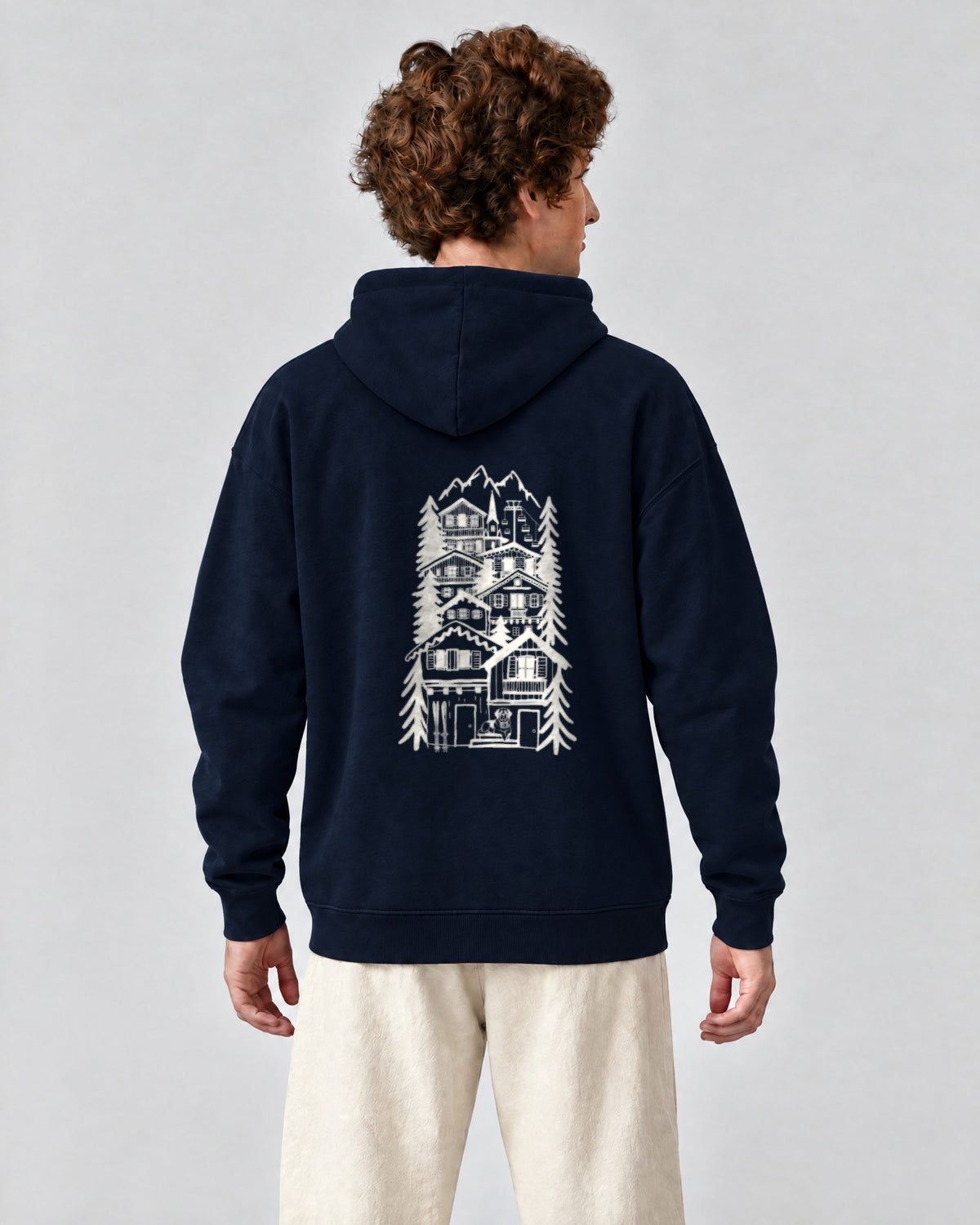 St Moritz Chapter Hoodie - Navy on a model, from behind