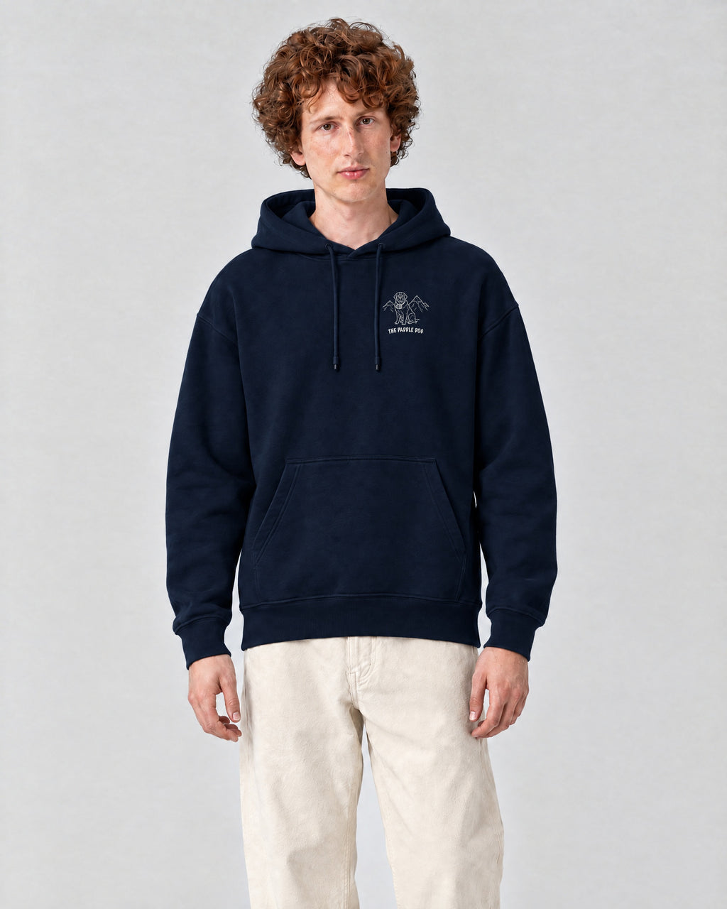St Moritz Chapter Hoodie - Navy on a model, from the front
