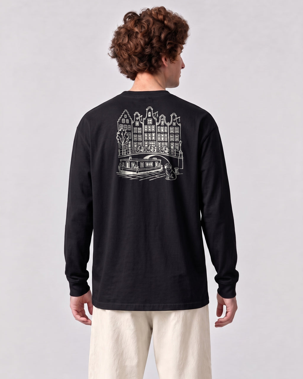 Amsterdam Chapter Long Sleeve - Black on a model, from behind