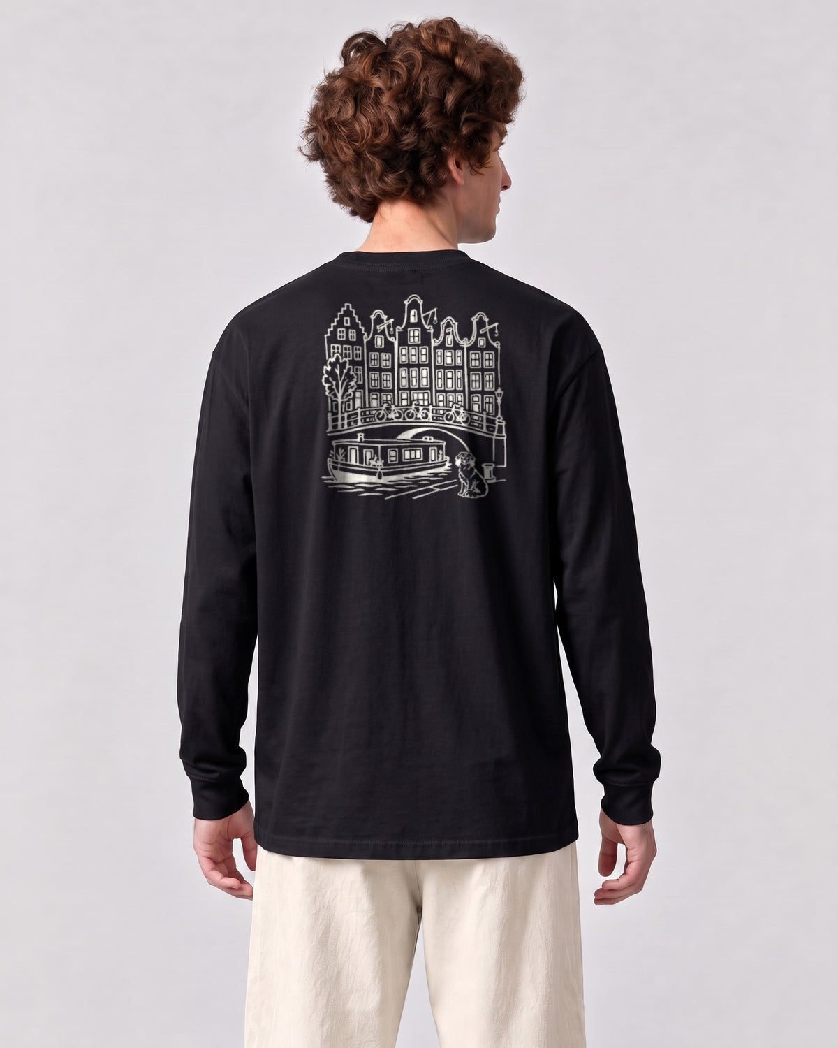 Amsterdam Chapter Long Sleeve - Black on a model, from behind