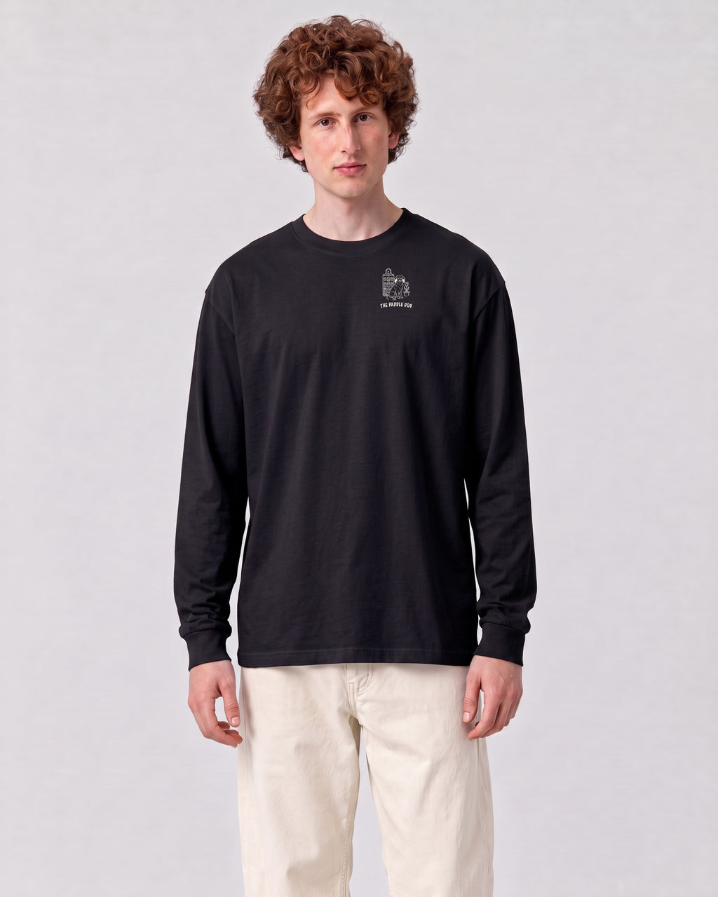 Amsterdam Chapter Long Sleeve - Black on a model, from the front