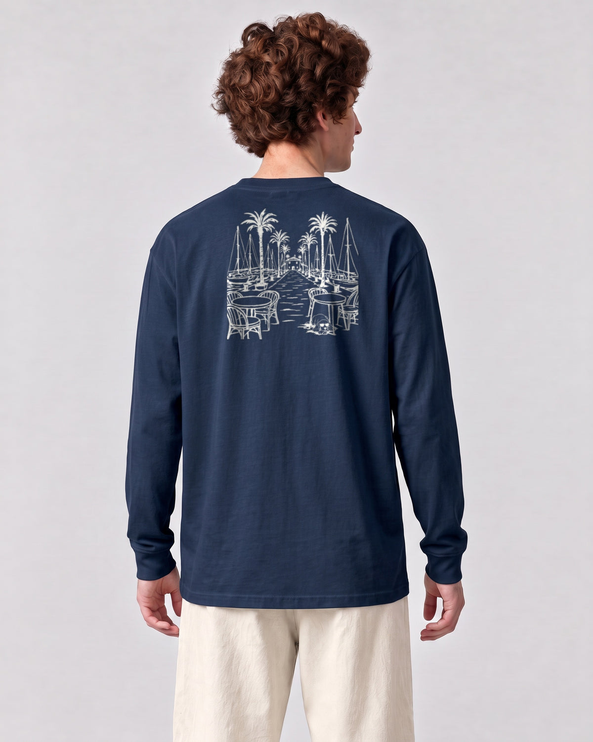 Marbella Chapter Long Sleeve - Navy on a model, from behind