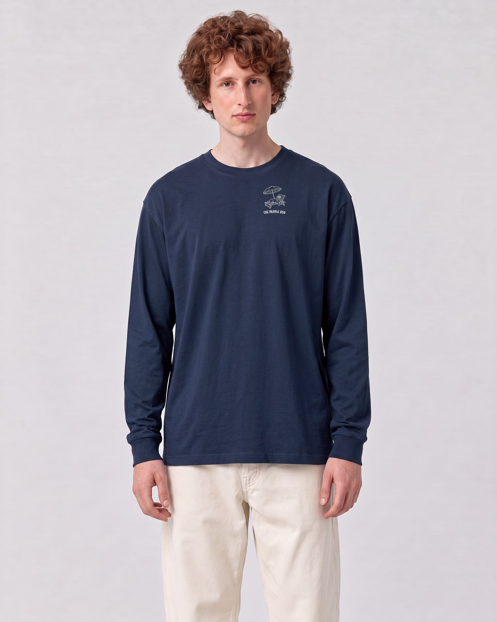 Marbella Chapter Long Sleeve - Navy on a model, from the front
