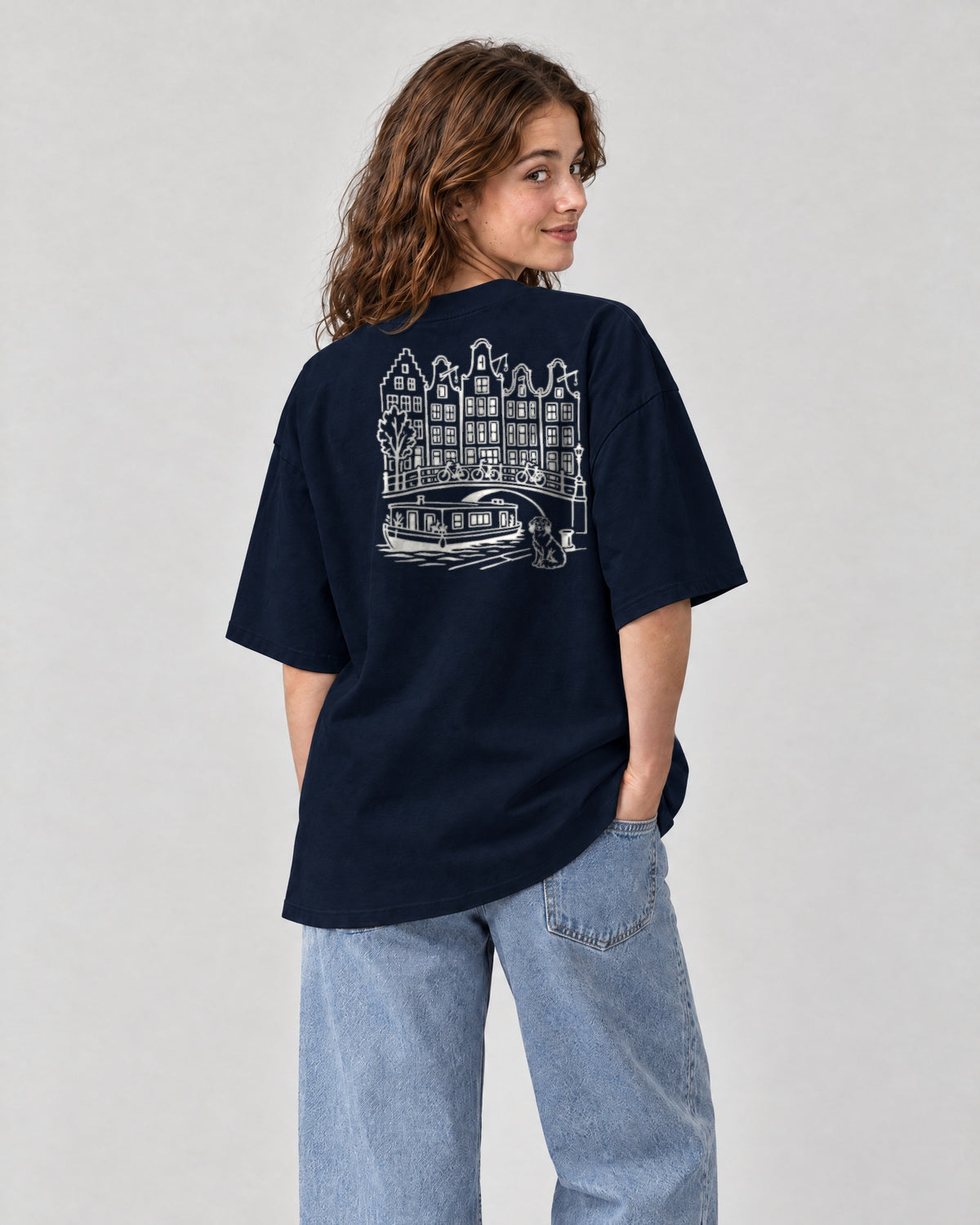 Amsterdam Chapter Tee - Navy on a model, from behind