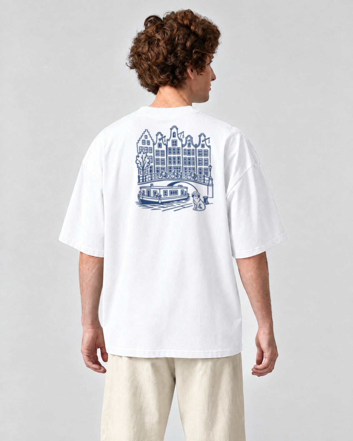 Amsterdam Chapter Tee - White on a model, from behind