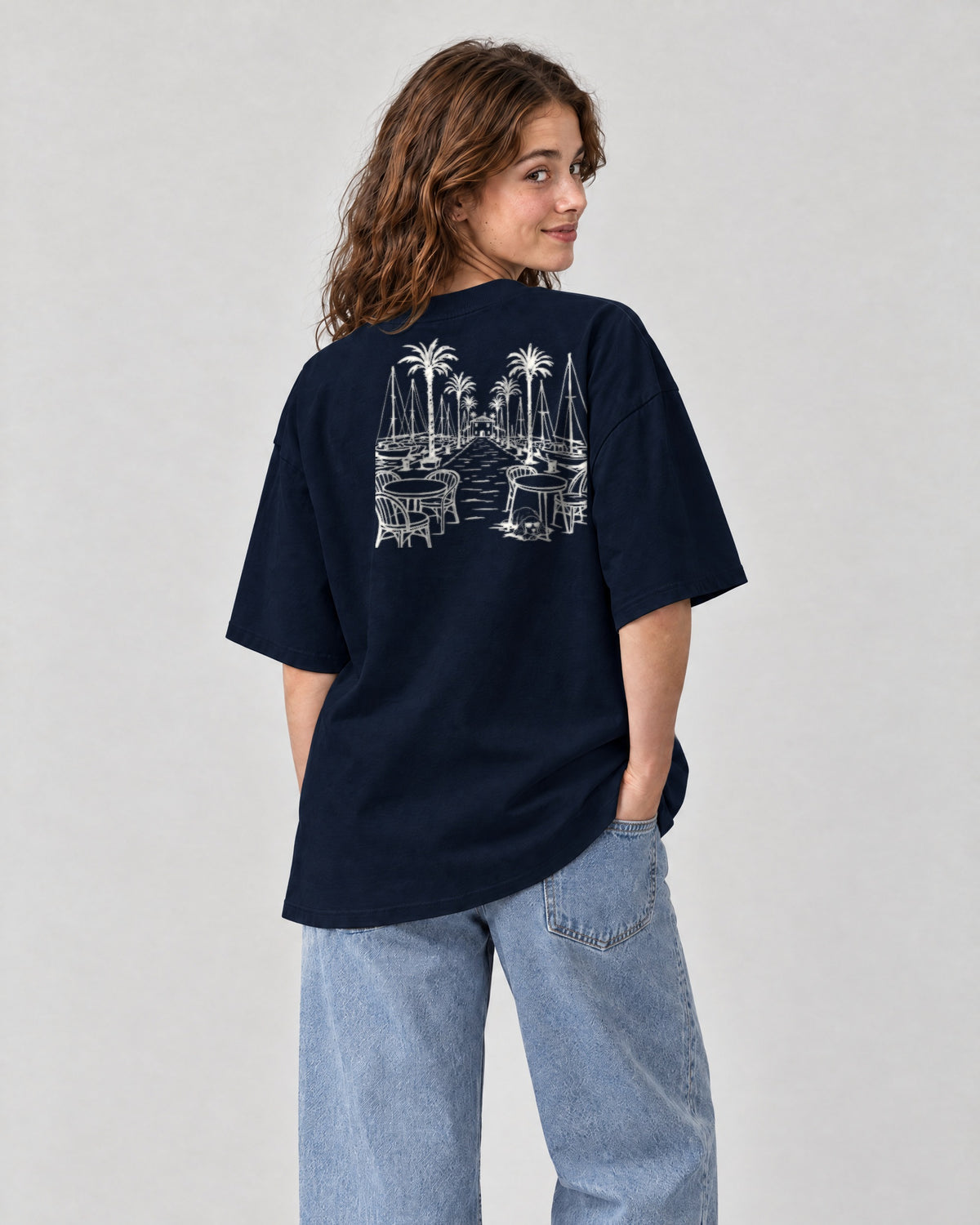 Marbella Chapter Tee - Navy on a model, from behind