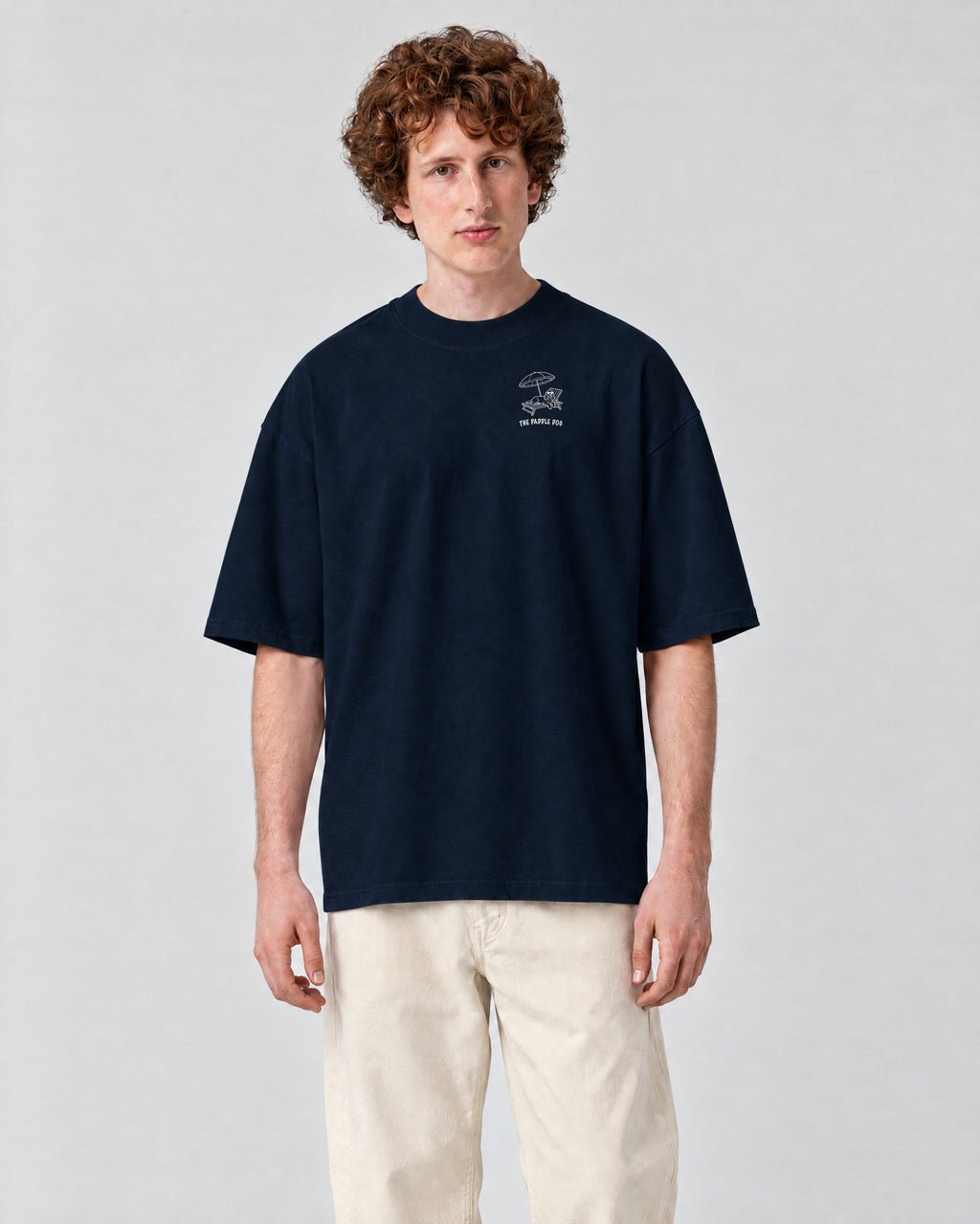 Marbella Chapter Tee - Navy on a model, from the front