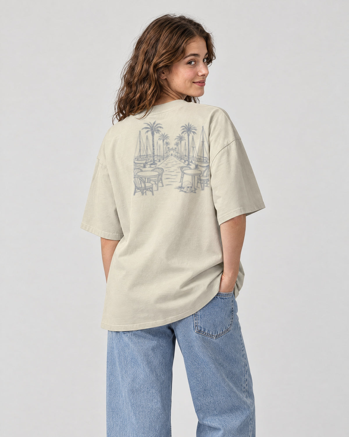 Marbella Chapter Tee - Stone on a model, from behind