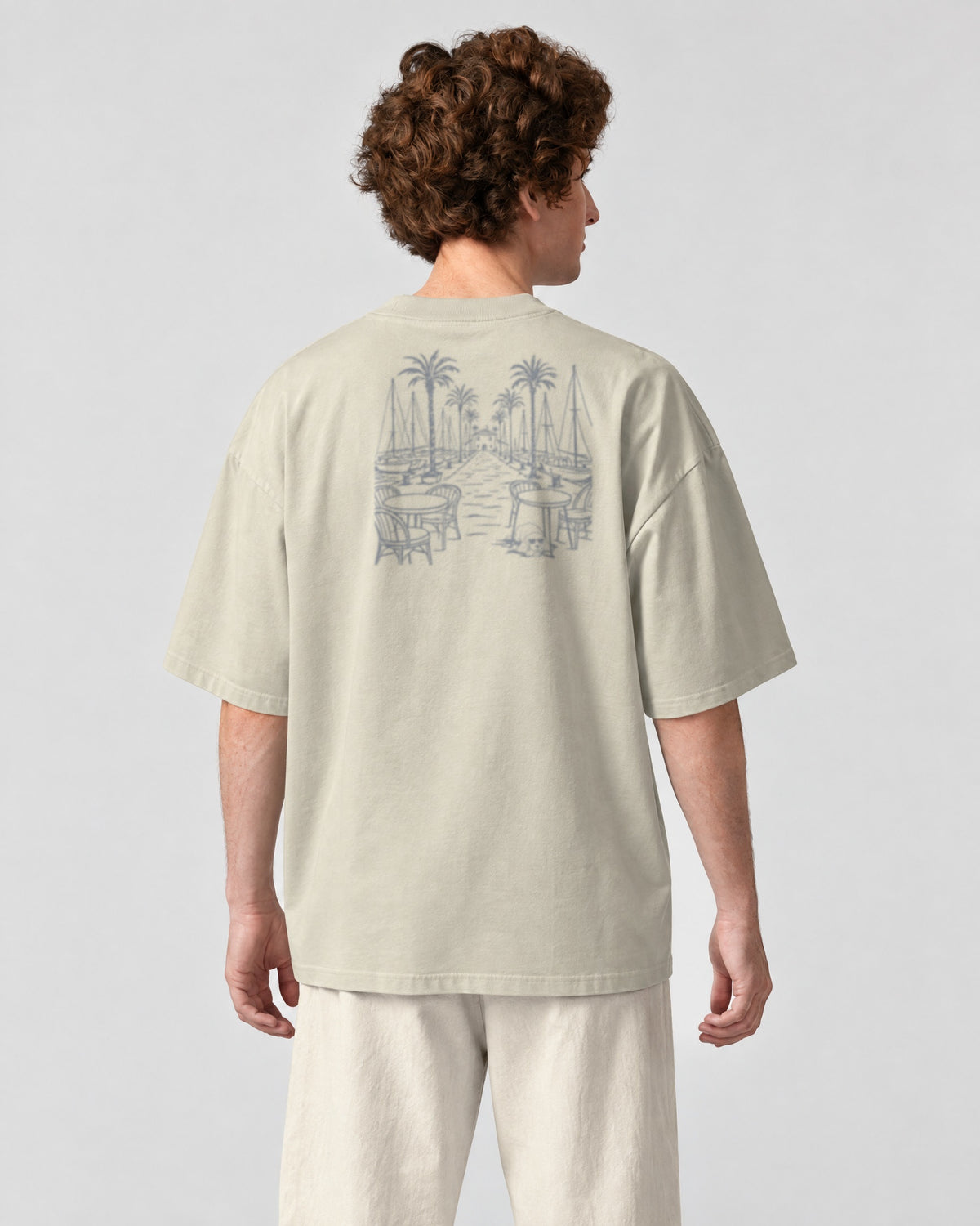 Marbella Chapter Tee - Stone on a model, from behind