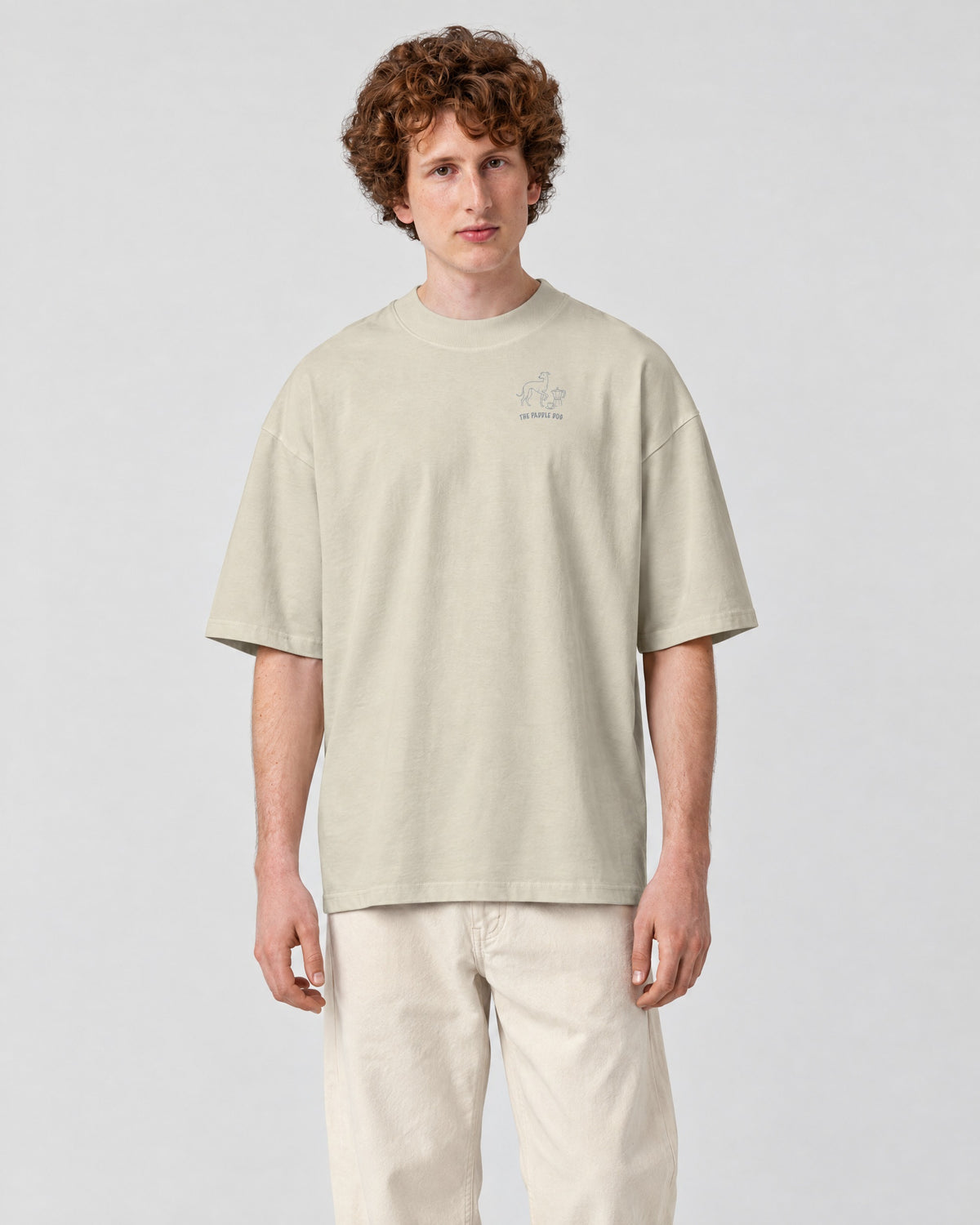 Milano Chapter Tee - Stone on a model, from the front