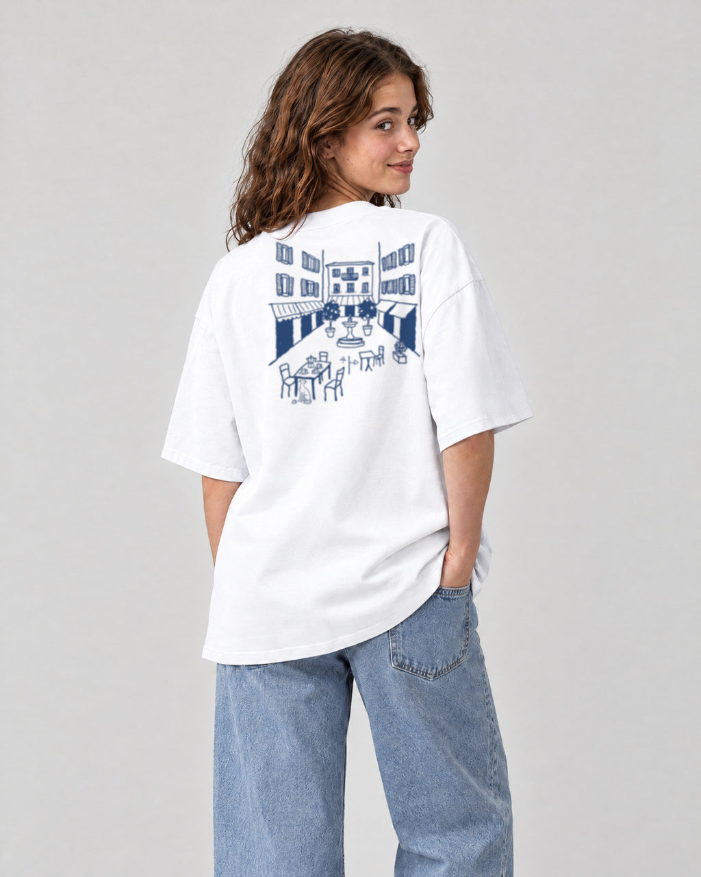 Milano Chapter Tee - White on a model, from behind
