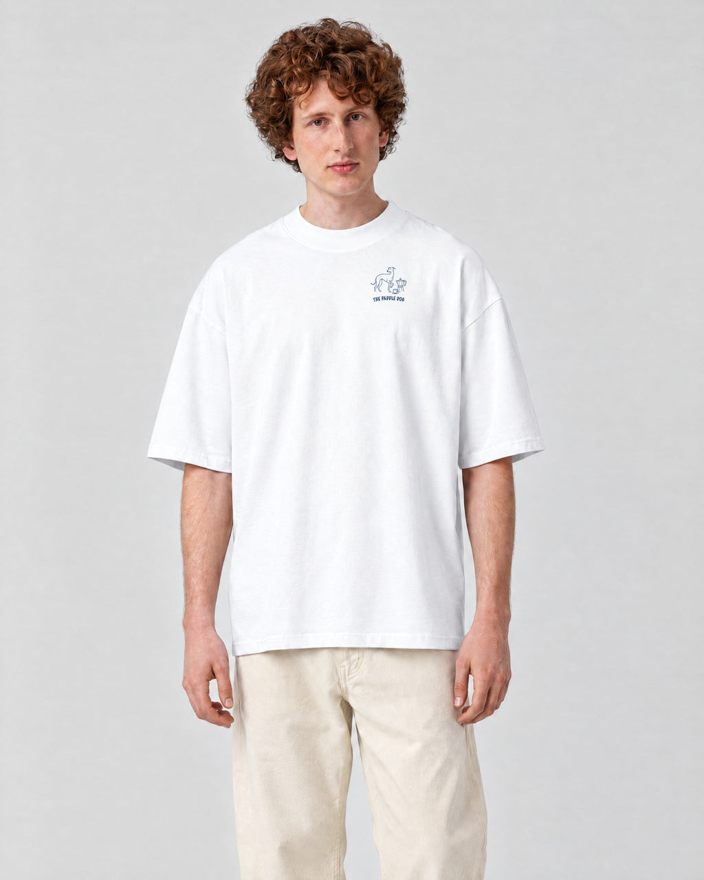 Milano Chapter Tee - White on a model, from the front