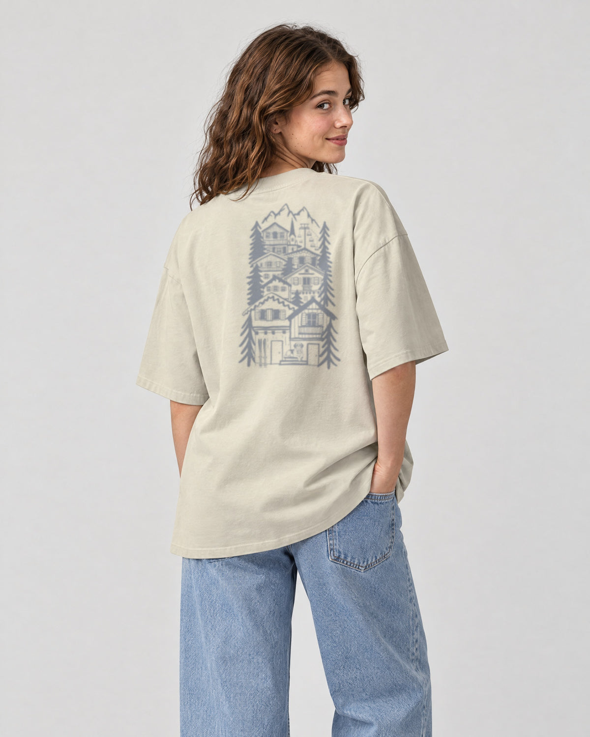 St Moritz Chapter Tee - Stone on a model, from behind