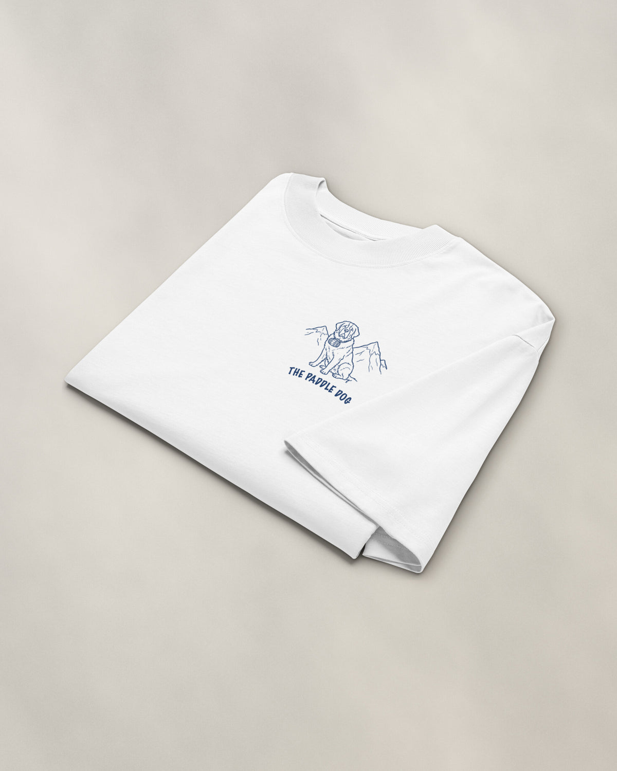 St Moritz Chapter Tee - White, folded, the crest on the chest